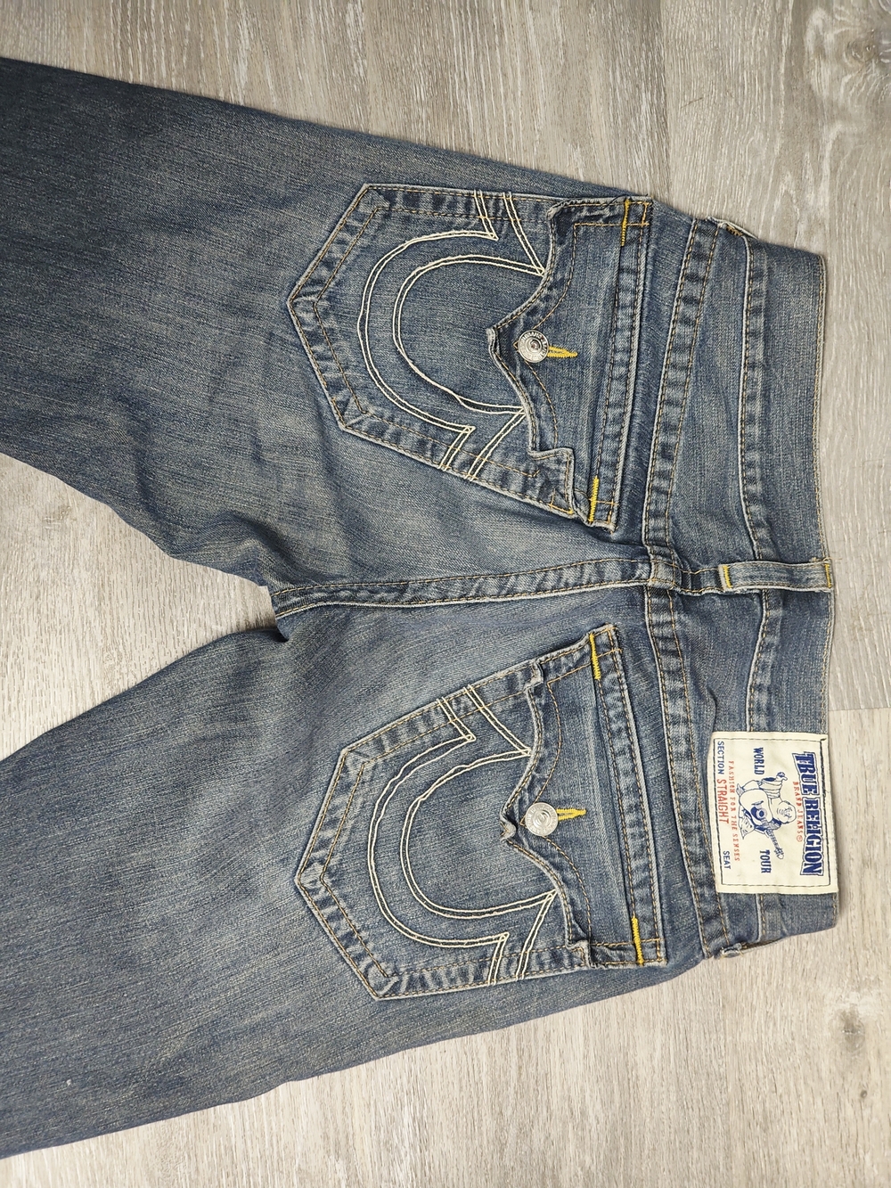 True Religion Men’s Blue Denim Jeans with Yellow Stitch Accents